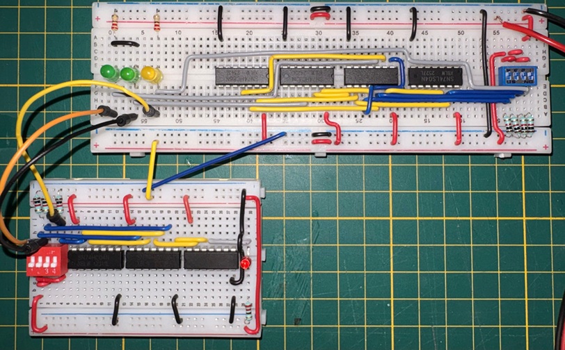 Breadboard showing the 3-bit prime detector integrated with partition logic and a 2:1 MUX to form a 4-bit detector.